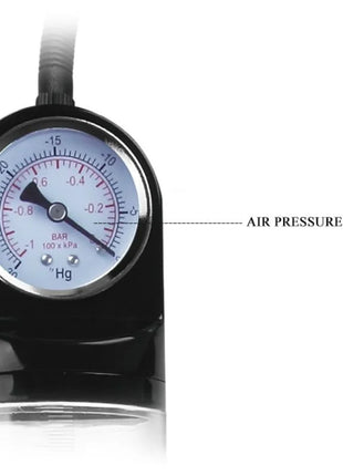 Schwarze erektionspumpe mit barometer, rundem zifferblatt mit rot schwarzen markierungen, silberner fassung und schlauch