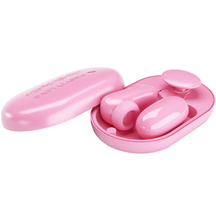 Rosa plastik ohrstöpsel in passender ovaler box mit graviertem text von pretty love magic box vibrationskugel und rosa stimulator