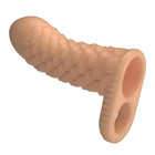 Peachfarbene pretty love nesmith penisextender sleeve aus silikon mit strukturierter schuppenoptik und zwei kreisförmigen öffnungen