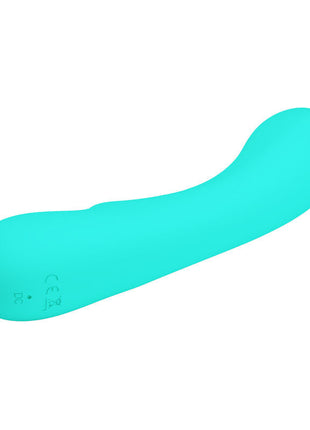 Ein eleganter türkiser silikonvibrator mit geschwungener form und dezenter markierung am grund von pretty love prescott