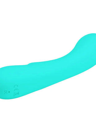 Ein eleganter türkiser silikonvibrator mit geschwungener form und dezenter markierung am grund von pretty love prescott