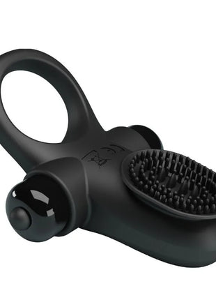 Schwarzer silikonvibratorring mit texturiertem pinselkopf und glänzendem seitlichem knopf für den schwarzen penis