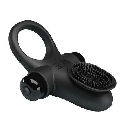 Schwarzer silikonvibratorring mit texturiertem pinselkopf und glänzendem seitlichem knopf für den schwarzen penis