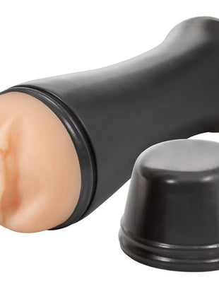 Schwarzer silikon cockring mit pfirsichfarbener realistischer struktur innen und passendem schwarzem deckel im privaten masturbator heisse bombshell to go