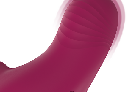 Ein eleganter magentafarbener silikon pocket klitorisstimulator rithual shushu pro mit zwei leistungsmotoren und geriffelter oberfläche