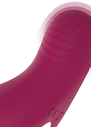 Ein eleganter magentafarbener silikon pocket klitorisstimulator rithual shushu pro mit zwei leistungsmotoren und geriffelter oberfläche