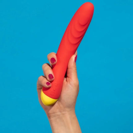 Ein lebhafter roter romp hype g-punkt-vibrator mit glattem silikon und gelbem sockel leiser motor