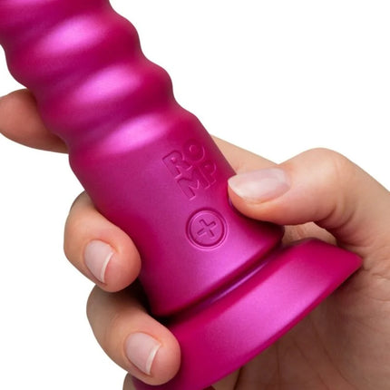 Vibrant pink metallic romp jiggle stoßvibrator with textured body embossed branding and plus symbol button