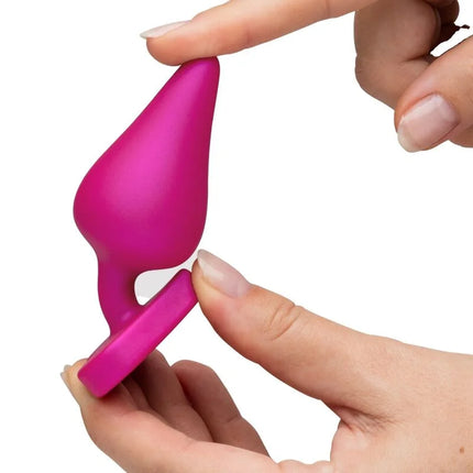 Vibranter pinker silikon analplug mit abgestufter größe und herzbasis für schrittweises analtraining romp luster