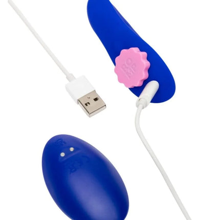 Blauer romp party höschenvibrator aus silikon mit pinker blumenförmiger fernbedienung und weißem usb-kabel