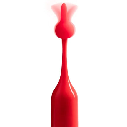 Ein roter romp pop klitorisvibrator aus silikon mit modernem ergonomischem design und rundem kopf