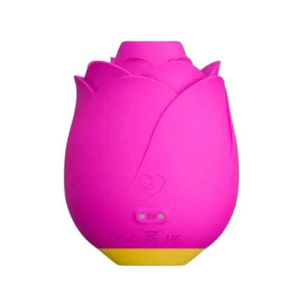 Romp rose klitorisstimulator aus silikon in pink mit gelber basis und magnetischer usb-aufladung für pleasure air