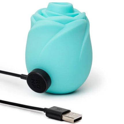 Turquiser silikon-rose usb-ladestift mit schwarzer basis im romp rose glow stil zur erzeugung von künstlichem licht
