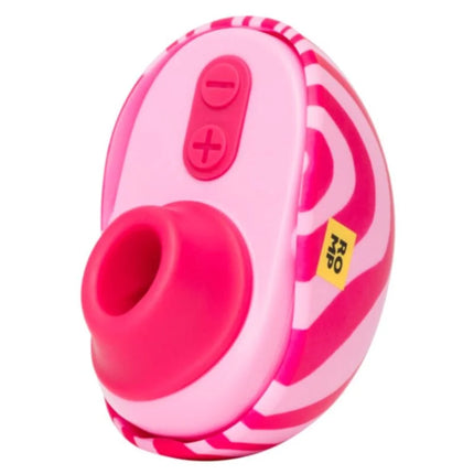 Kompakter runder auflegevibrator in pink und weiß mit hellpinkem aufsatz und kontrollelementen für äußere stimulation