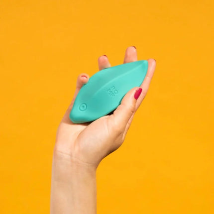 Romp wave klitorisvibrator aus teal silikon in fischform für gezielte äußere stimulation