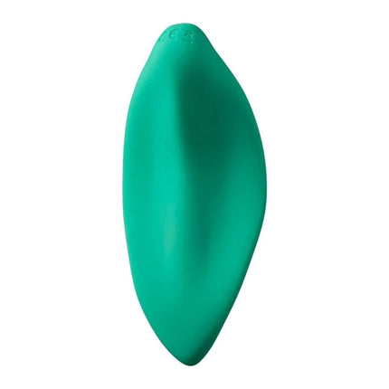 Ein ergonomischer romp wave klitorisvibrator aus mattiertem teal silikon mit glatter ovale form und dezenter prägung in aquagrün