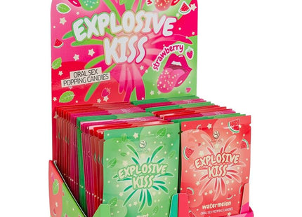 Farbenfrohe glossy packets von explosive kiss popping candies in mintgrün und erdbeerrosa aus dem secret play explosives süßigkeits-display mit 48 einheiten