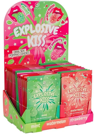 Farbenfrohe glossy packets von explosive kiss popping candies in mintgrün und erdbeerrosa aus dem secret play explosives süßigkeits-display mit 48 einheiten