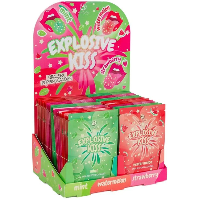 Farbenfrohe glossy packets von explosive kiss popping candies in mintgrün und erdbeerrosa aus dem secret play explosives süßigkeits-display mit 48 einheiten