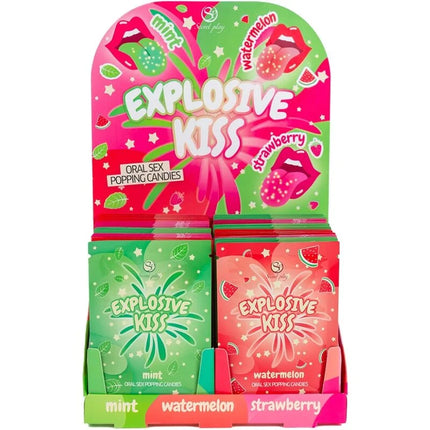 Vibranter pink grüner displayständer mit explosivem kuss popping candy in minze wassermelone und erdbeere