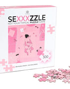 Rosa puzzlekasten für das sexxxzzle spiel von secret play mit spielerischer illustration zweier figuren in intimer szene
