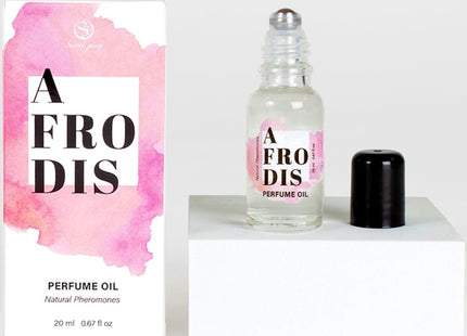 Ein klarer glas-roller mit afrodis parfümöl mit pheromonen für frauen 20 ml und passende rosa verpackung