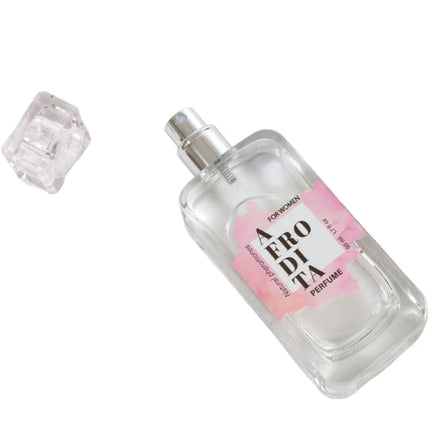 Klarer glas-parfümflakon mit silberner sprühdüse und rosa etikett aero di ta für frauen secretplay aphrodite pheromon spray 50 ml