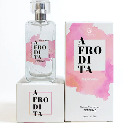 Ein gefrosteter glas-parfümflakon mit silberner spraydüse und rosa aquarell-etikett neben passender box secretplay aphrodite natürliche pheromon parfumspray 50 ml
