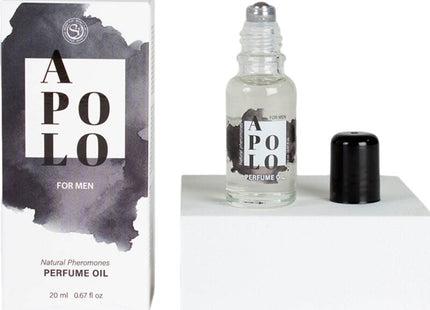 Klare glas roll-on flasche mit silberner rollerkappe und schwarzem schraubverschluss neben weißer box mit schwarzer typografie für secretplay apolo pheromon-parfümöl 20 ml