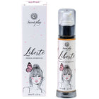 Weiße zylinderflasche mit schwarzem pumpenspender und silberner basis für liberté sensual intimate oil von secret play