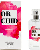 Klare glasparfümflasche secretplay orchidee natürliche pheromon parfumspray 50 ml mit silbernem zerstäuber und rosa etikett neben passender verpackung