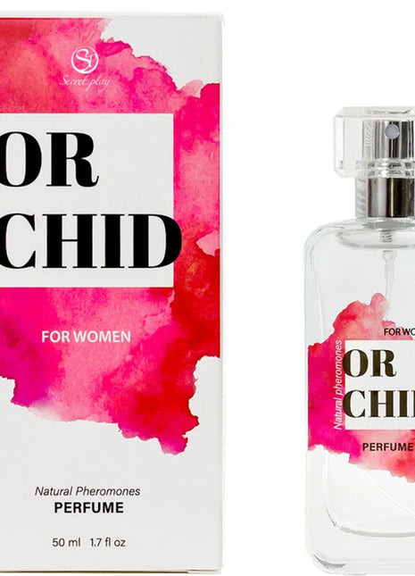 Klare glasparfümflasche secretplay orchidee natürliche pheromon parfumspray 50 ml mit silbernem zerstäuber und rosa etikett neben passender verpackung