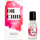 Eine klare glasflasche mit schwarzem deckel und rosa aquarelle etikett enthält secretplay orchideen-parfümöl mit natürlichen pheromonen 20 ml