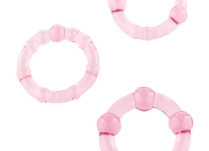 Seven creations set aus drei rosa penisringen aus durchsichtigem kunststoff mit abgerundeter segmentierter form