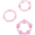 Seven creations set aus drei rosa penisringen aus durchsichtigem kunststoff mit abgerundeter segmentierter form