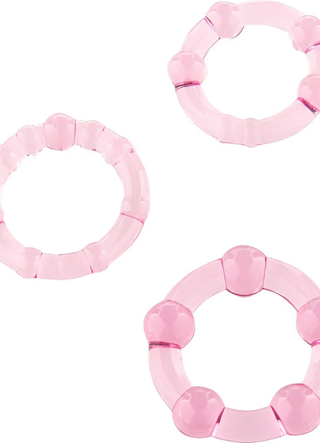 Seven creations set aus drei rosa penisringen aus durchsichtigem kunststoff mit abgerundeter segmentierter form