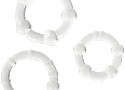 Set aus drei weißen glänzenden plastikringen mit abgerundeten erhebungen von seven creations