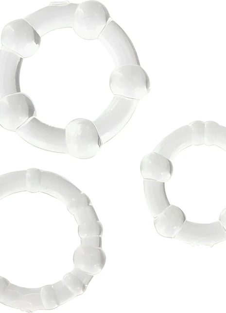 Set aus drei weißen glänzenden plastikringen mit abgerundeten erhebungen von seven creations