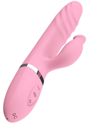 Pink silikonspielzeug mit gewölbtem, geripptem design und silbernem akzentband bei sinnliche stimulation wärmezunge und vibration fuchsia