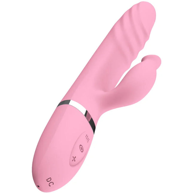 Pink silikonspielzeug mit gewölbtem, geripptem design und silbernem akzentband bei sinnliche stimulation wärmezunge und vibration fuchsia
