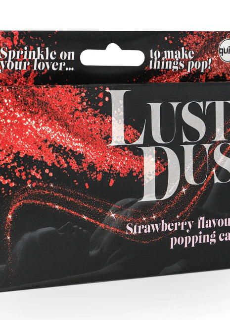 Rote glitzernde erdbeergeschmack essbares pulver in schwarzer box mit silbernem quirK logo von spencer & fleetwood