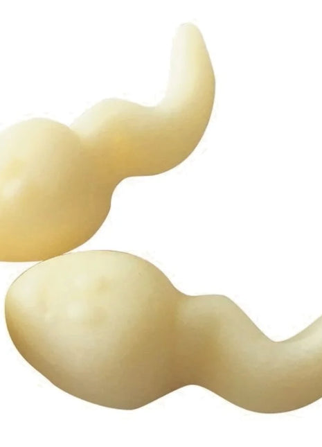Creamfarbene, glatte, leicht glänzende gummiobjekte in form von kugelsperma von spencer & fleetwood, 120 g