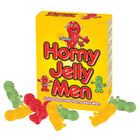 Helle gelbe schachtel mit kaubonbons in form einer puppe mit penis, featuring rote und grüne cartoonfiguren