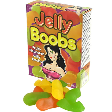 Bunte box kaubonbons in form von brüsten mit cartoonillustration und fruchtigen jelly bonbons vorne liegend