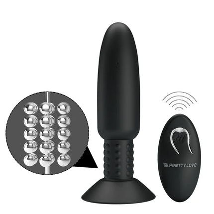 Schwarzer silikon-stecker mit vibration und rotation und silbernen metallperlen am schaft mit passendem steuergerät