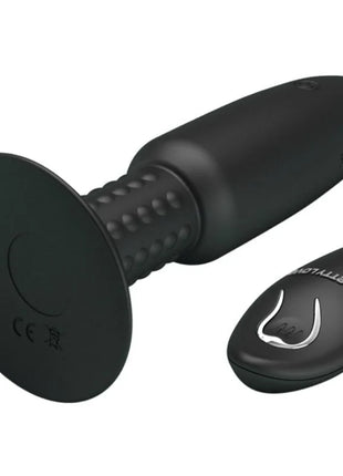 Schwarzer silikon vibrator mit fernbedienung und strukturierter grifffläche für vibration und rotation