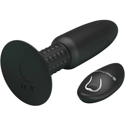Schwarzer silikon vibrator mit fernbedienung und strukturierter grifffläche für vibration und rotation