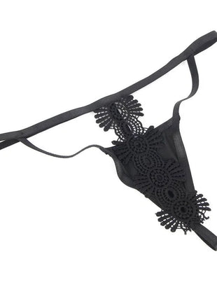 Schwarzer spitzenstring mit filigranen floralen mustern und dünnen trägern aus dem subblime dessous-set für sinnliche momente