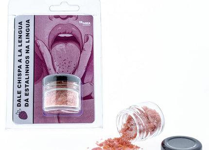 Ein klarer glasbehälter mit schwarzem deckel, der rosa-rote körnige erdbeer-zauberküsse von taloka enthält