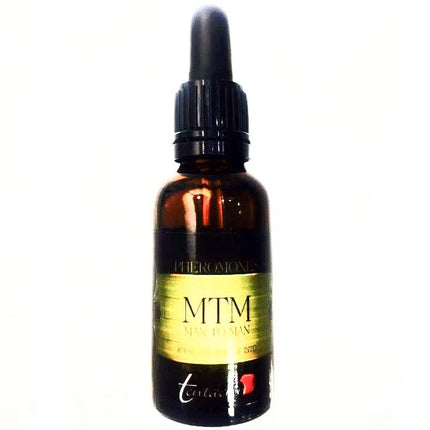 Ein eleganter bernsteinfarbener glasflakon mit schwarzem tropfverschluss und goldenem etikett für mtm man to man pheromonspray tentacion gay human identische synthetische pheromone 30 ml